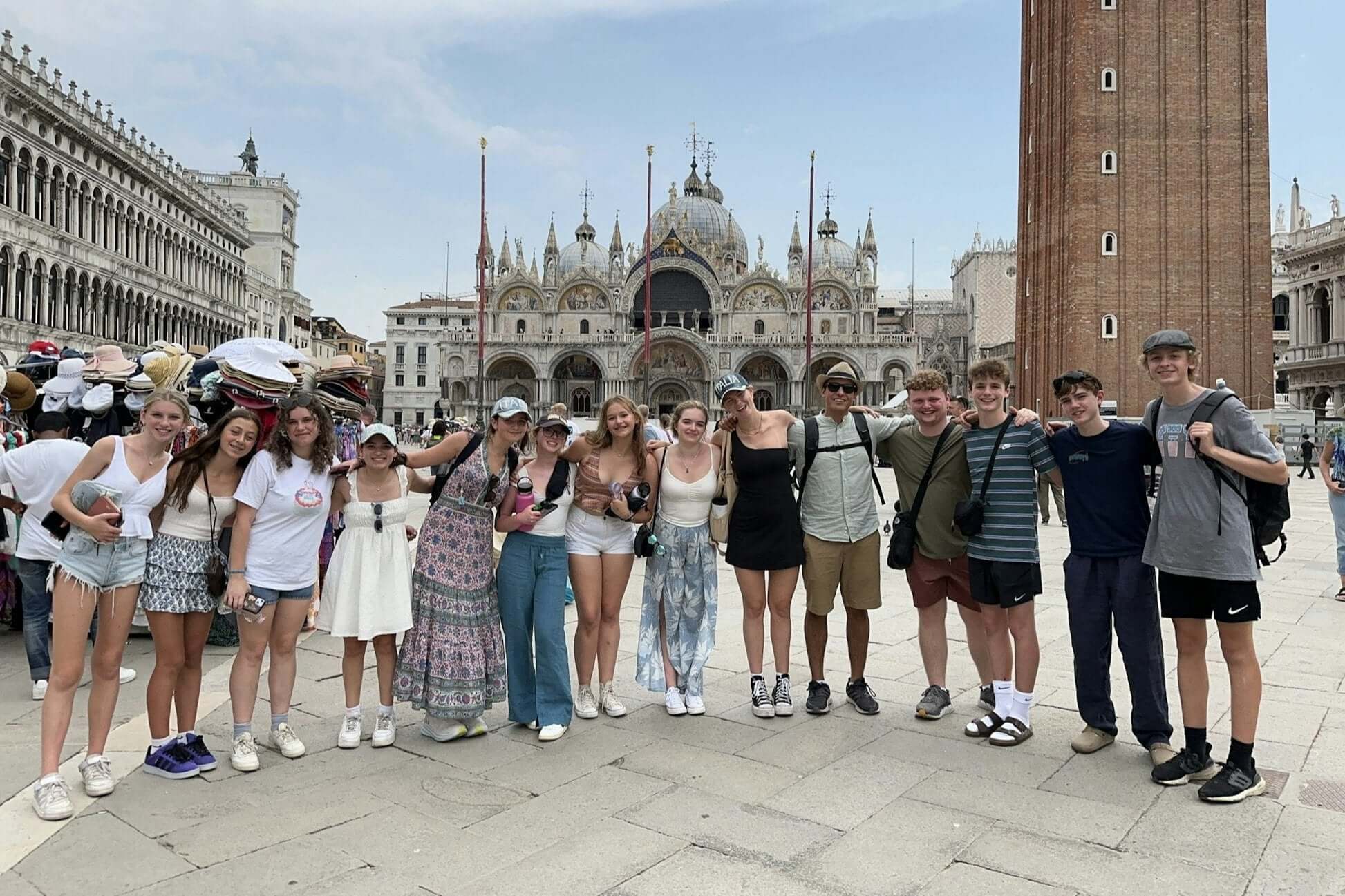 group of students enjoying their Northern Italy adventure in Venice, exploring the historic St. Mark's Square together.