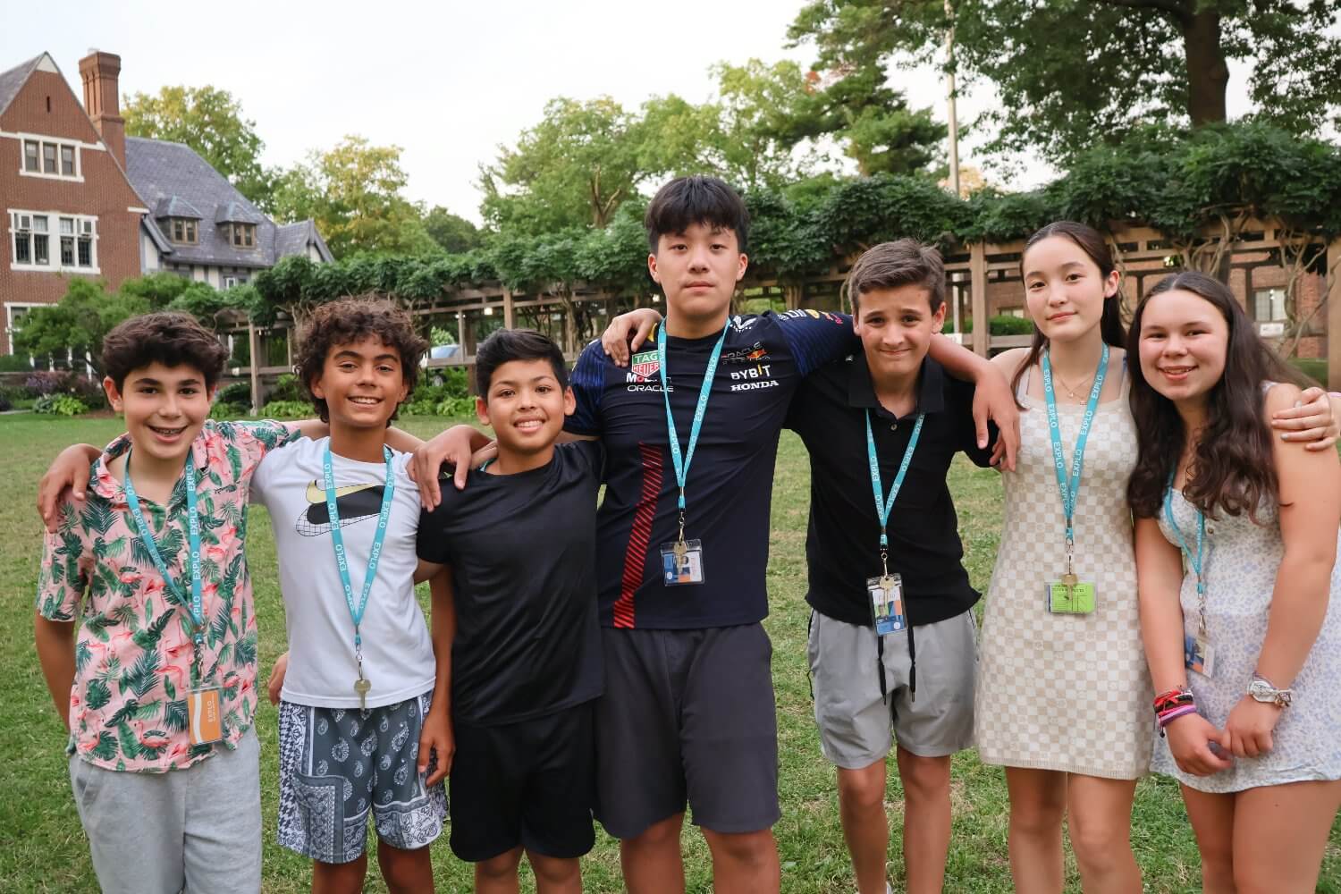 Group of middle school campers enjoying summer program activities outdoors at EXPLO summer camp.